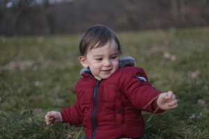 Playing with grass at 1.